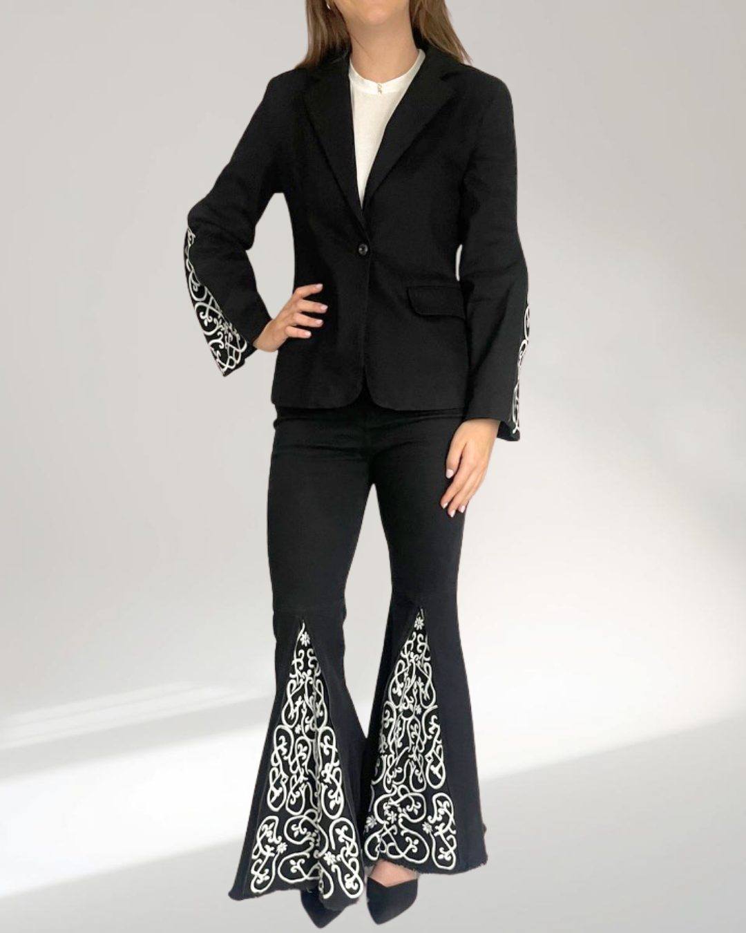 model wearing the blazer set with sleeves half open full view