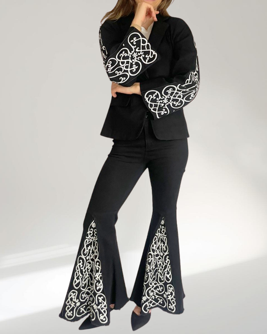 model standing front shot wearing the blazer and jeans